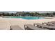 Community swimming pool and lounge area with ample seating and palm trees at 797 Salerno Circle # C, Myrtle Beach, SC 29579
