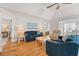 Cozy living room with comfortable seating, natural light, ceiling fan, and access to the dining area at 820 9Th Ave. S, North Myrtle Beach, SC 29582