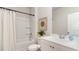 Spotless bathroom featuring a shower-tub combo, white vanity, and modern decor for a serene experience at 877 Farmers Passage Loop, Loris, SC 29569