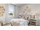 Charming bedroom featuring a comfortable bed, soft pillows, and stylish decor for a peaceful retreat at 877 Farmers Passage Loop, Loris, SC 29569