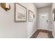 Inviting entryway with wood floors, neutral walls, and decorative accents that create a warm atmosphere at 877 Farmers Passage Loop, Loris, SC 29569