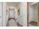 Welcoming entryway with neutral walls, wood floors and decor that creates a warm atmosphere at 877 Farmers Passage Loop, Loris, SC 29569