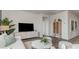 Cozy living room with modern furniture and a stylish entertainment center at 877 Farmers Passage Loop, Loris, SC 29569