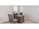 A functional home office space with a desk and comfortable seating, designed for productivity at 877 Farmers Passage Loop, Loris, SC 29569