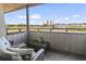 Relaxing balcony with seating area and scenic views of the golf course and lake at 9501 Shore Dr. # A-311, Myrtle Beach, SC 29572
