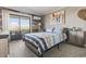 Charming bedroom featuring nautical decor, a balcony with a view, and comfortable furnishings at 9501 Shore Dr. # A-311, Myrtle Beach, SC 29572
