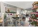 Charming dining area with view of Christmas decorations, and access to the outdoor balcony at 9501 Shore Dr. # A-311, Myrtle Beach, SC 29572