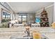 Inviting dining area with seating, festive decor, and view of the exterior balcony at 9501 Shore Dr. # A-311, Myrtle Beach, SC 29572