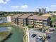 Gorgeous condo building exterior featuring marsh front views, parking, and a beautifully landscaped setting at 9501 Shore Dr. # A-311, Myrtle Beach, SC 29572