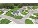 Aerial view of white home with a well-kept lawn and landscaping in a desirable neighborhood at 1001 Greencrest Ct., Conway, SC 29526