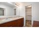 Well-lit bathroom with double sinks, cabinets, and a walk-in closet at 1001 Greencrest Ct., Conway, SC 29526