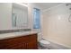 Standard bathroom with single vanity, shower and tub combination and window at 1001 Greencrest Ct., Conway, SC 29526