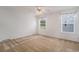 Bright bedroom with carpet, ceiling fan, and windows at 1001 Greencrest Ct., Conway, SC 29526