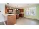 Well-equipped kitchen with tile backsplash, island, and stainless steel appliances at 1001 Greencrest Ct., Conway, SC 29526
