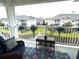 Enjoy the community view from this cozy balcony with pond views and comfortable outdoor seating at 1029 Ray Costin Way # Villa 909, Murrells Inlet, SC 29576