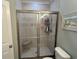Modern bathroom with tiled shower and granite seat, enhancing comfort and style at 1029 Ray Costin Way # Villa 909, Murrells Inlet, SC 29576