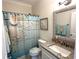 Nautical themed bathroom with vanity and shower curtain at 1029 Ray Costin Way # Villa 909, Murrells Inlet, SC 29576