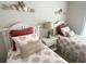 Bedroom with two twin beds, bedside table and nautical themed decorations at 1029 Ray Costin Way # Villa 909, Murrells Inlet, SC 29576