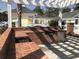 Brick grilling area with built-in grill and counter space under a shady pergola at 1029 Ray Costin Way # Villa 909, Murrells Inlet, SC 29576