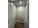 A storage closet featuring light hardwood floors and a wired rack shelf for optimal storage solutions at 1064 Oak Meadow Dr., Conway, SC 29526