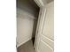 A storage closet featuring carpeted floors and a wired rack shelf for optimal storage solutions at 1064 Oak Meadow Dr., Conway, SC 29526