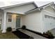 Charming home exterior with a two-car garage and tasteful landscaping at 1064 Oak Meadow Dr., Conway, SC 29526