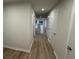 Hallway with luxury vinyl plank flooring leading to other rooms at 1064 Oak Meadow Dr., Conway, SC 29526