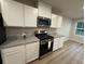 Stylish kitchen featuring stainless steel appliances, granite counters, and sleek modern design at 1064 Oak Meadow Dr., Conway, SC 29526