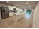 Modern kitchen with stainless steel appliances, granite countertops, island, and ample cabinet space at 1064 Oak Meadow Dr., Conway, SC 29526