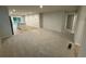 Open floor plan featuring a spacious living room and modern kitchen with an island and stainless appliances at 1064 Oak Meadow Dr., Conway, SC 29526