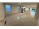 Open floor plan featuring a spacious living room and modern kitchen with stainless steel appliances at 1064 Oak Meadow Dr., Conway, SC 29526