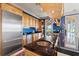 Modern kitchen with stainless steel appliances, dark countertops, and wood cabinets at 1080 Waterway Ln., Myrtle Beach, SC 29572