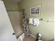 Cozy bathroom with tub/shower combo with stylish shell curtain at 1101 Possum Trot Rd. # A202, North Myrtle Beach, SC 29582