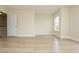 Open bedroom with wood floors and a window with lots of natural light at 112 Molinia Dr., Murrells Inlet, SC 29576