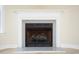 Elegant fireplace featuring a granite surround and a classic white mantel design at 112 Molinia Dr., Murrells Inlet, SC 29576
