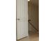 Open doorway to a hallway with wood floors and a staircase at 112 Molinia Dr., Murrells Inlet, SC 29576