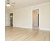 Spacious living room with hardwood flooring, neutral paint, and natural light at 112 Molinia Dr., Murrells Inlet, SC 29576