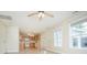 Open-concept living space with laminate floors connecting the living room and kitchen at 112 Molinia Dr., Murrells Inlet, SC 29576