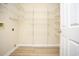 Spacious walk-in closet with custom shelving for optimal organization and storage at 112 Molinia Dr., Murrells Inlet, SC 29576