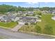 Beautiful aerial view of home showing manicured lawn and the surrounding neighborhood at 1220 Dunraven Ct., Conway, SC 29527