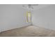 Well-lit bedroom showcasing neutral walls, carpeted floors, a ceiling fan and natural light through the window at 1220 Dunraven Ct., Conway, SC 29527