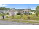 Well-kept single-story home boasts manicured lawn, an attached two-car garage, and inviting front entrance at 1220 Dunraven Ct., Conway, SC 29527