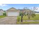 Charming single-story home with a well-maintained lawn, two-car garage, and inviting curb appeal at 1220 Dunraven Ct., Conway, SC 29527