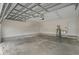 Spacious garage featuring high ceilings and ample room for vehicles and storage at 1220 Dunraven Ct., Conway, SC 29527