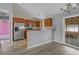 Galley kitchen boasts modern appliances, ample cabinet space, and a breakfast bar overlooking the dining area at 1220 Dunraven Ct., Conway, SC 29527