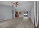 Open-concept living space with modern flooring, leading into a well-lit kitchen and dining area at 1220 Dunraven Ct., Conway, SC 29527