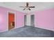 This spacious main bedroom includes a fan and closet, offering comfort and functionality at 1220 Dunraven Ct., Conway, SC 29527