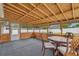 Well-maintained screened patio featuring a table set, perfect for enjoying the outdoors in comfort at 1220 Dunraven Ct., Conway, SC 29527