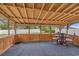 Spacious screened patio with wooden ceiling and furnishings, perfect for outdoor dining and entertaining at 1220 Dunraven Ct., Conway, SC 29527