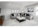Cozy bonus room with neutral colors, carpet floors, and comfortable seating arrangements at 1308 Piper Glen Dr, Sunset Beach, NC 28468